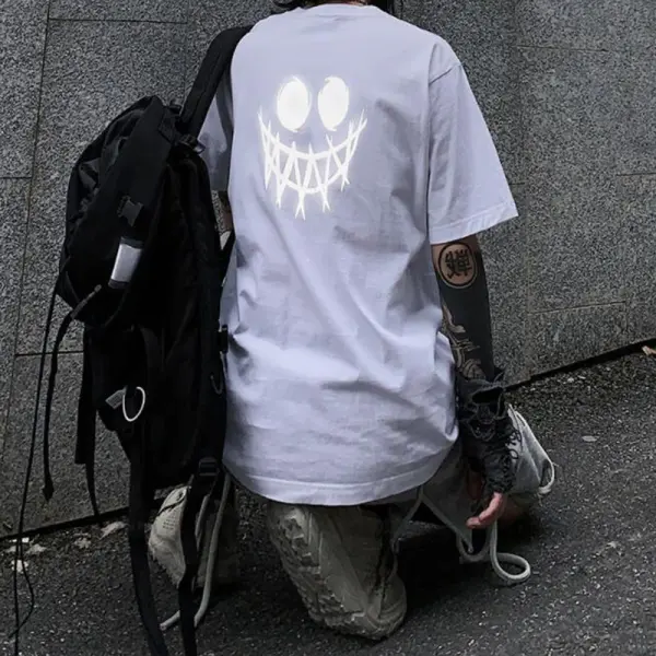 Camiseta Negra Reflectante Joker Laugh - Faciway.com 