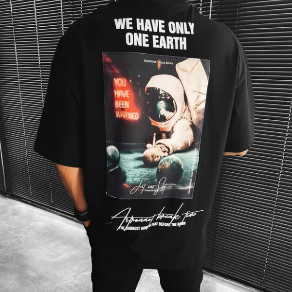 t-shirt a maniche corte con stampa astronauta - Faciway.com 