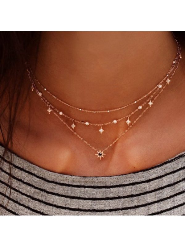 Metallic shiny black diamond three-tier necklace with stars