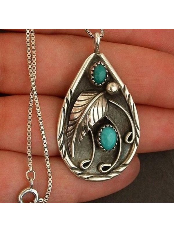 

Turquoise vintage dyed black feather pendant necklace