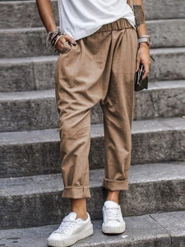 

Women's solid color casual pockets elastic waist harem trousers